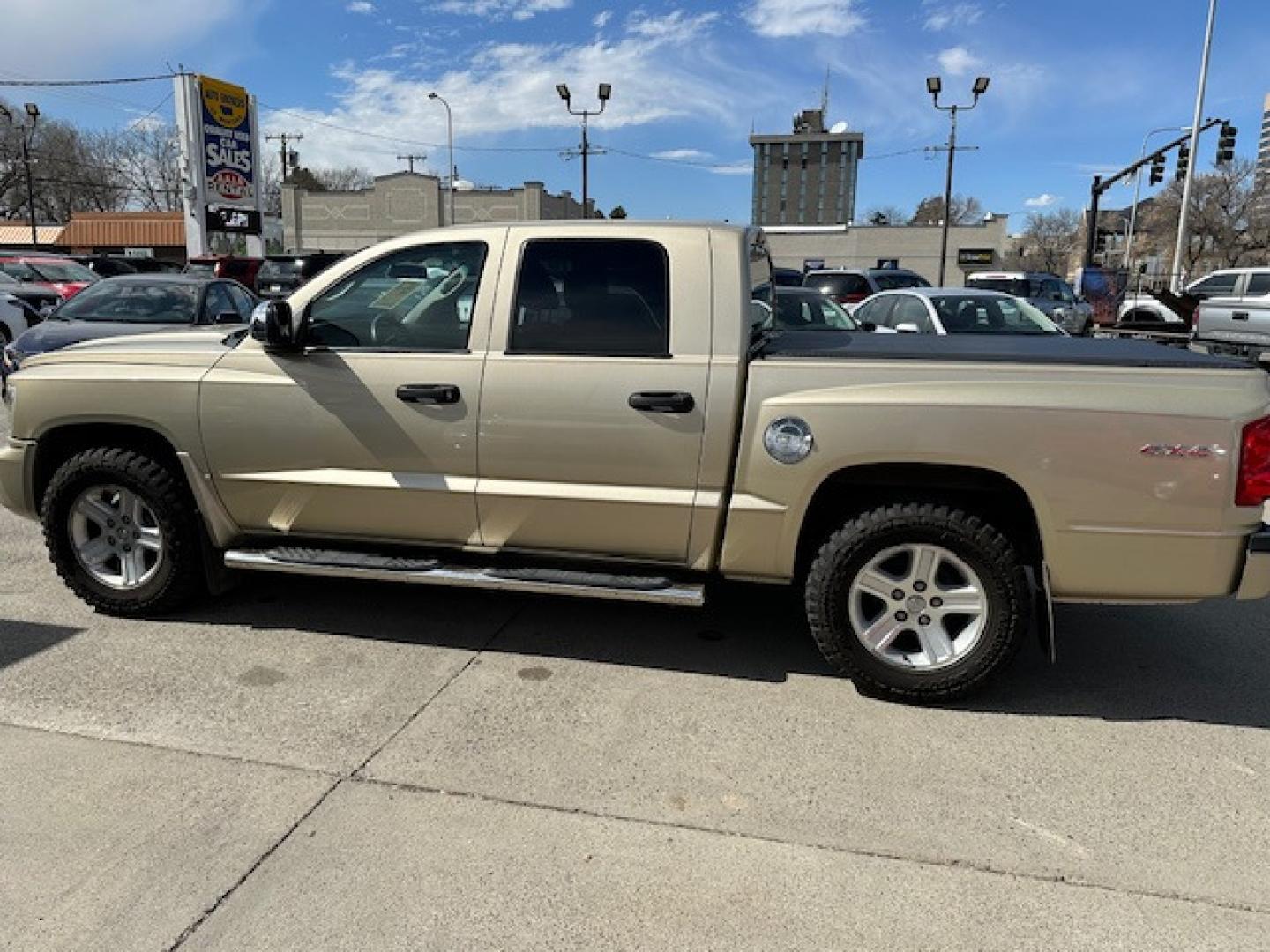 2011 /BEIGE Dodge Dakota SLT (1D7RW3GK3BS) with an 3.7 V6 engine, Automatic transmission, located at 3200 1st Avenue North, Billings, MT, 59101, (406) 245-9055, 45.779270, -108.510742 - Very Nice 4 Door Pickup with A Ton of Options! Power Windows, Power Door Locks, Remote Key Entry, Rugged Terrain Tires, Tilt Steering Column, Cruise Control, 4X4, Running Boards, Tonneau Cover, Towing, Custom Bumper Guard and Only 79,000 Miles. CarFax Dealer Auto Brokers of Montana/AA&A Auto Ren - Photo#4